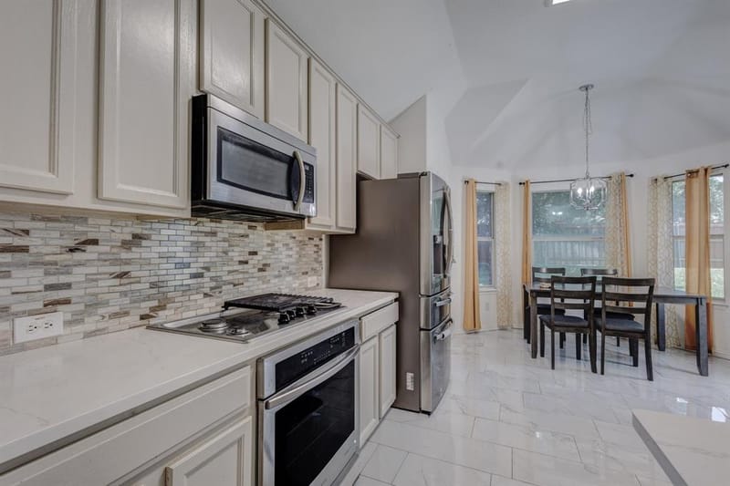 10718 J A Forster Drive, Rowlett TX 75089 - Photo 4