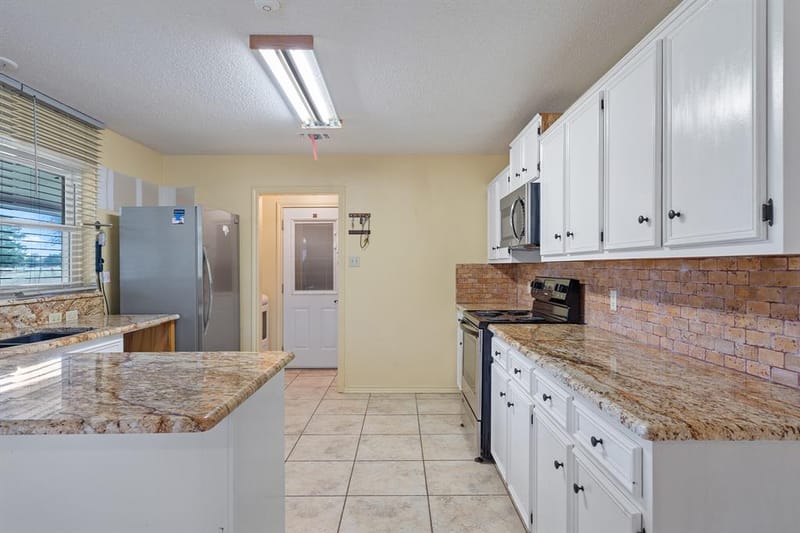 3016 County Road 4405, Commerce TX 75428 - Photo 11