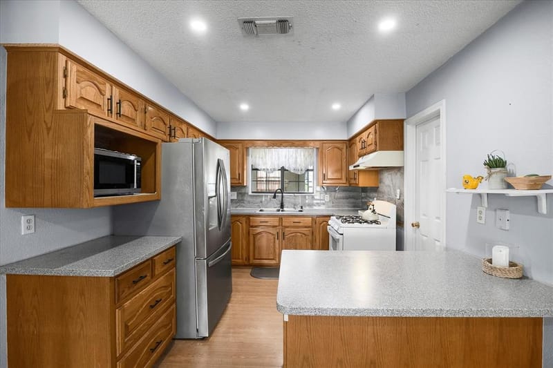 6006 County Road 4604, Commerce TX 75428 - Photo 11